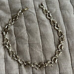 Gold tone bow Necklace